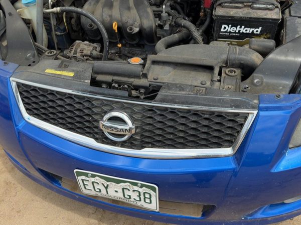 2007-2012 Nissan Sentra Front Grille Assembly Oem Sport Package 62070Et80A — photo 1