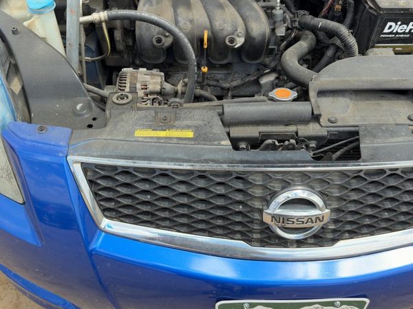 2007-2012 Nissan Sentra Front Grille Assembly Oem Sport Package 62070Et80A — photo 4
