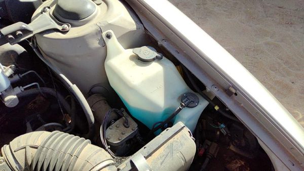 1992 Buick Park Ave Ultra Windshield Washer Fluid Reservoir With Pump Wiper Tank — photo 3