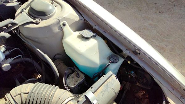 1992 Buick Park Ave Ultra Windshield Washer Fluid Reservoir With Pump Wiper Tank — photo 4