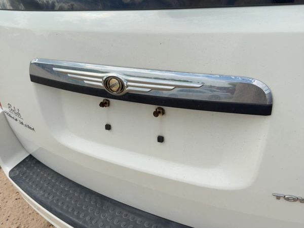 2008-2010 Town & Country License Plate Trim Surround Panel Oem Tail Trunk Finish — photo 1