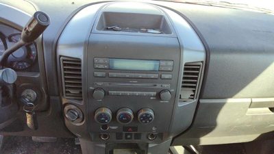 2004-2006 Nissan Titan Trim Bezel Around Radio Surround Dash Panel Oem