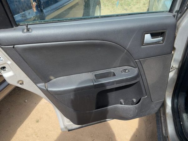 05-07 Fivehundred Driver Left Rear Door Trim Panel With Switches Back Black Hw — photo 1