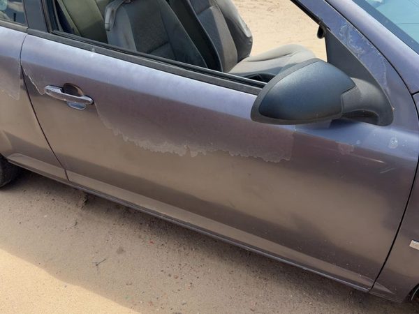 2006 Chevrolet Cobalt Front Door RH Amethyst 84U — photo 2