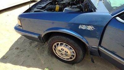 1994 Oldsmobile Cutlass Ciera Fender LH Olds Blue