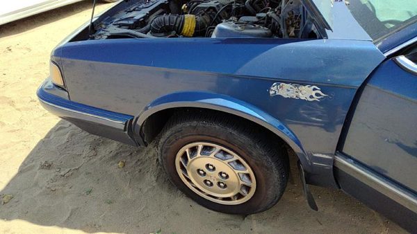 1994 Oldsmobile Cutlass Ciera Fender LH Olds Blue — photo 2