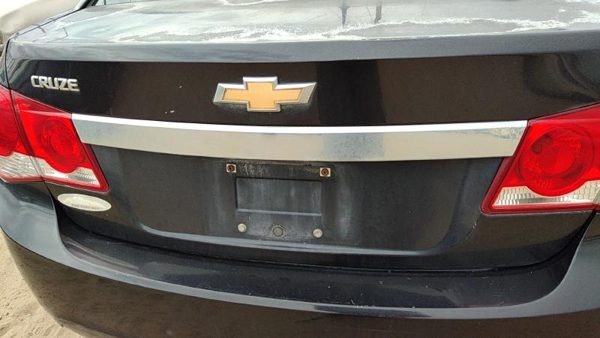 2011 Chevy Cruze Tail Finish Panel License Plate Trim Surround OEM Trunk Black — photo 1