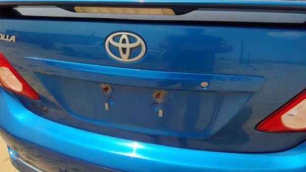 2010 Toyota Corolla License Plate Trim Surround Panel Tail Trunk Finish Blue 8T7 — photo 6