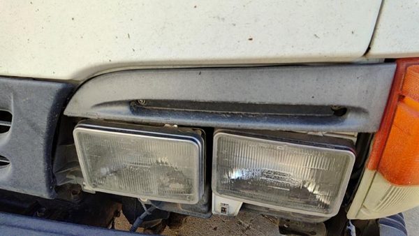 1996 Isuzu Npr Headlight Door Driver Left Trim Bezel OEM LH — photo 2