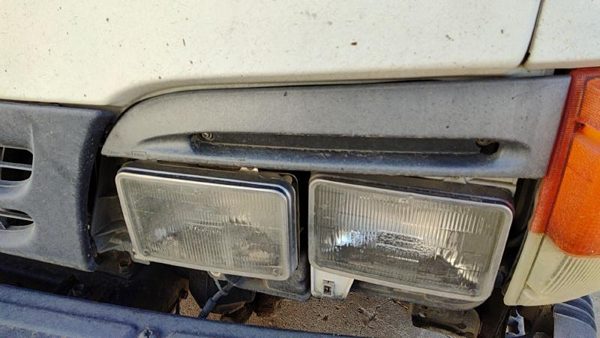1996 Isuzu Npr Headlight Door Driver Left Trim Bezel OEM LH — photo 1