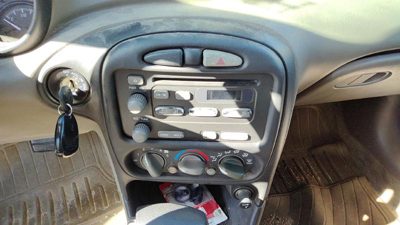 2002-2005 Pontiac Grand Am Trim Bezel Around Radio Surround Dash Panel Oem