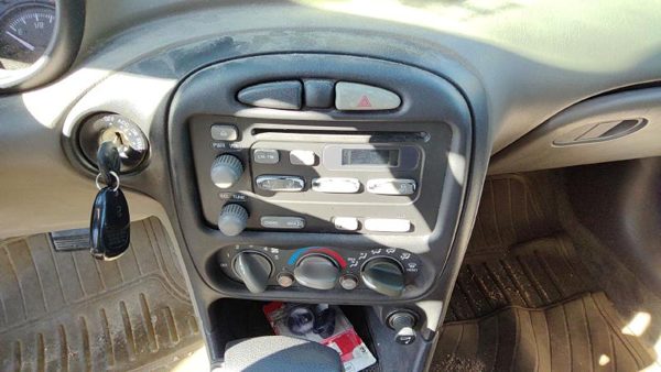 2002-2005 Pontiac Grand Am Trim Bezel Around Radio Surround Dash Panel Oem — photo 1