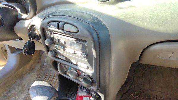 2002-2005 Pontiac Grand Am Trim Bezel Around Radio Surround Dash Panel Oem — photo 2