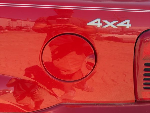 99-04 Grand Cherokee Fuel Tank Door With Hinge Gas Lid Oem Filler Flame Red Pr4 — photo 1