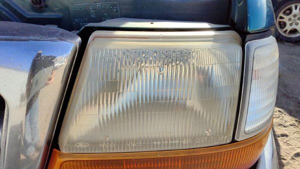 1998 Ford Ranger Headlamp Assembly LH F87Z13008FB — photo 1