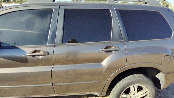 2004 Mitsubishi Endeavor Rear Door LH C04 Mineral Beige — photo 1