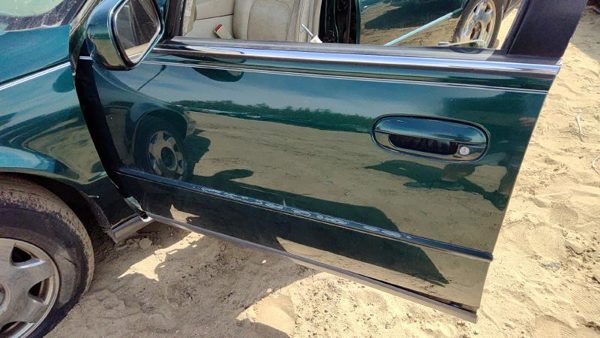1999 Cadillac Seville Front Door LH Green — photo 5