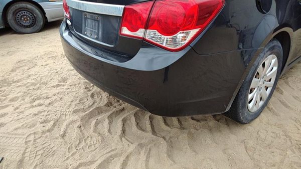 2011 Chevy Cruze Rear Bumper Assembly Cover OEM Back Black Gar — photo 1