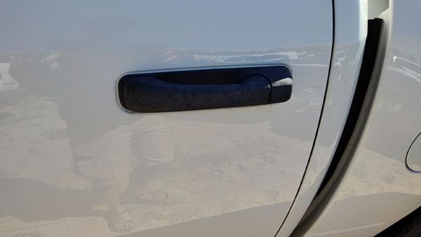 2016 Ram 1500 Outside Door Handle LH Dodge White PW7 — photo 1