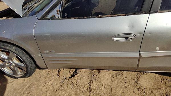 2004 Pontiac Bonneville Front Door LH Silver 67U — photo 1