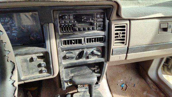 1994-1995 Jeep Grand Cherokee Trim Bezel Around Radio Surround Dash Panel Gray — photo 1