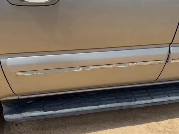 00-04 Suburban Passenger Rear Moulding From Door Back Trim Strip Pewter 11U — photo 1