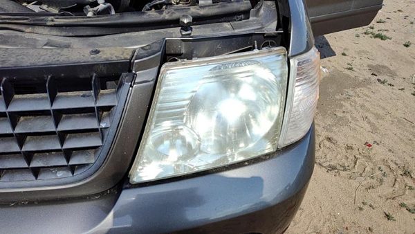2005 Ford Explorer Headlamp Assembly LH — photo 1