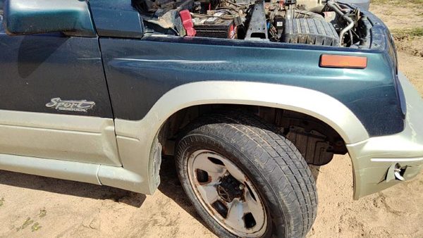 1996-1997 Suzuki Sidekick Passenger Right Front Wheel Flare Moulding Oem Fender — photo 1