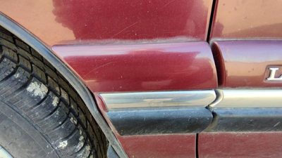 97-99 Buick Lesabre Driver Left Moulding From Fender Trim Strip 51B Bordeaux Red