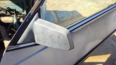 1985-1993 Pontiac Sunbird Driver Left Side Mirror Door Mounted Manual 20182801