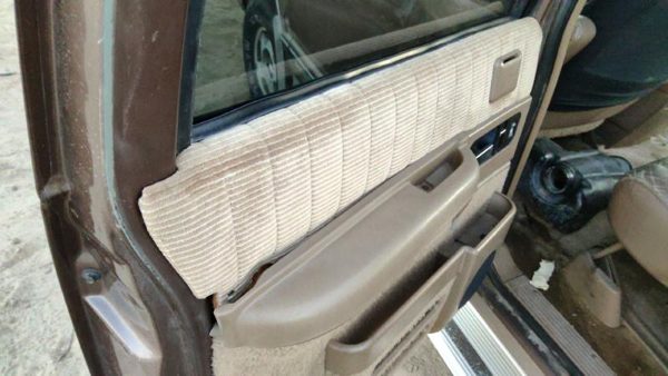 1992-1994 Chevy Suburban Driver Left Rear Door Trim Panel With Switches Back Tan — photo 4
