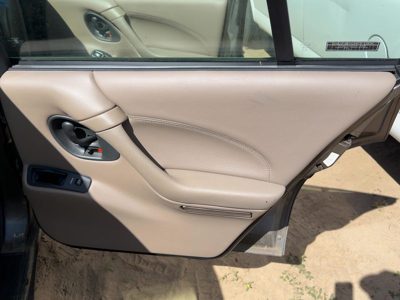 99 Bonneville Passenger Right Rear Door Trim Panel With Switches Back Tan