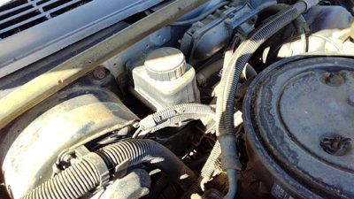 1985-1986 Pontiac Sunbird Power Steering Fluid Remote Reservoir Tank Oem 1.8L