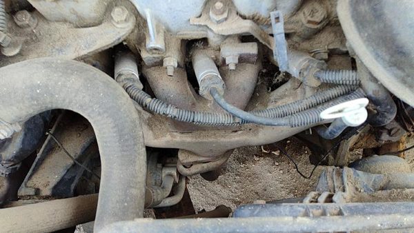 1985-1994 Pontiac Sunbird Exhaust Manifold Assembly Oem 1.8L 10018721 — photo 1