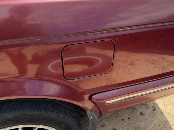 86-88 Maxima Fuel Tank Door With Hinge Gas Lid Oem Filler 4Dr Sedan 4 Door Red — photo 1