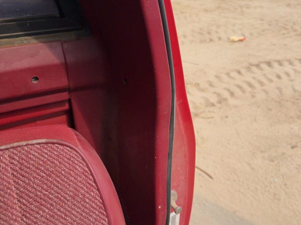 1987-1996 Dodge Dakota Driver Left B-Pillar Trim Red OEM — photo 2