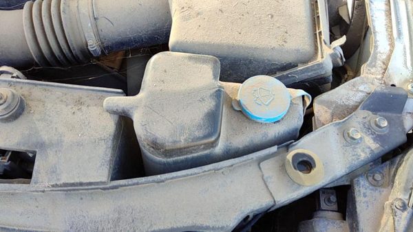 2004-2015 Nissan Titan Windshield Washer Fluid Reservoir With Pump Wiper Tank — photo 1