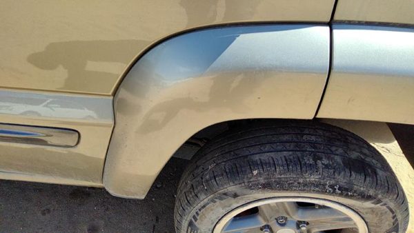 03-04 Jeep Liberty Driver Left Rear Forward Wheel Flare Door Moulding Khaki Pjc — photo 1