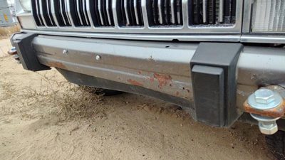 1984-1996 Jeep Cherokee Front Bumper Assembly With Brackets Oem