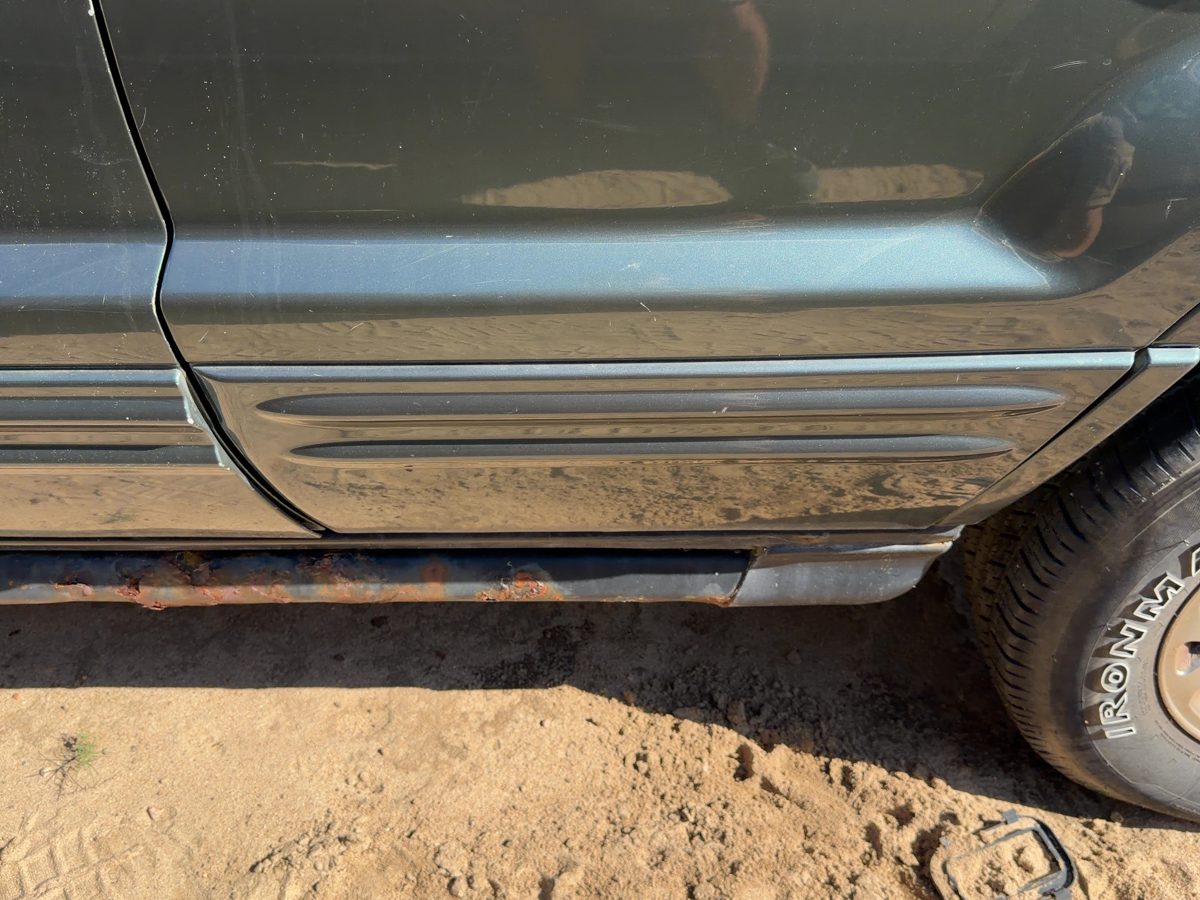 99-04 Grand Cherokee Left Rear Moulding From Door Back Overland Primed Green