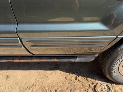 99-04 Grand Cherokee Left Rear Moulding From Door Back Overland Primed Green