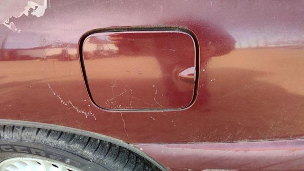1998 Buick Lesabre Fuel Tank Door With Hinge Gas Lid Oem Filler 51B Bordeaux Red — photo 1