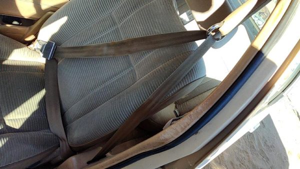 1984-1987 Ford Tempo Driver Left Front Seat Belt Retractor Oem Shoulder Tan — photo 1