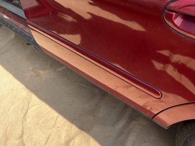 2000-2007 Ford Taurus Driver Left Rear Moulding From Door Oem Back Primed Red