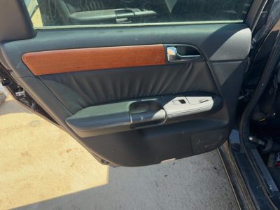 06-07 M35X Driver Left Rear Door Trim Panel With Switches Back Wood Graphite