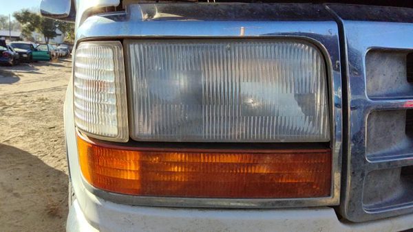 1995 Ford F150 Headlight Door RH — photo 1