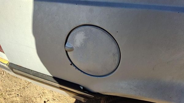 1985 Pontiac Sunbird Fuel Tank Door With Hinge Gas Lid Oem Filler Silver — photo 1