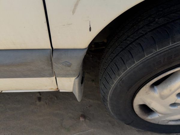 96-99 Town & Country Passenger Right Moulding Fender Trim Strip Cladding 4Dr — photo 1