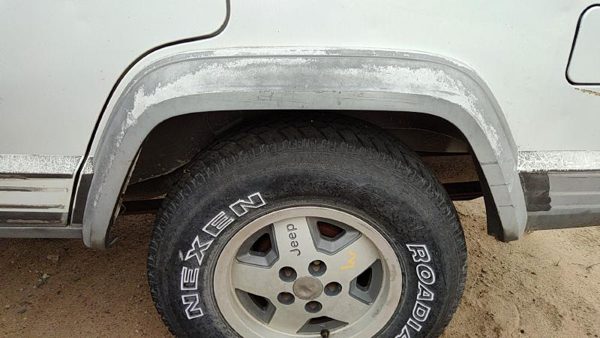 1987-1996 Jeep Cherokee Driver Left Rear Wheel Flare Moulding Oem Back — photo 1