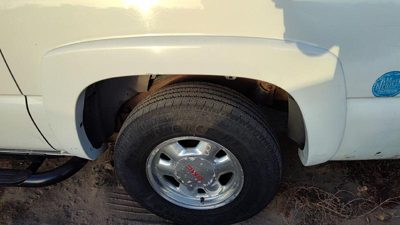 00-06 Chevy Suburban Driver Left Rear Wheel Flare Moulding Back 50U Summit White
